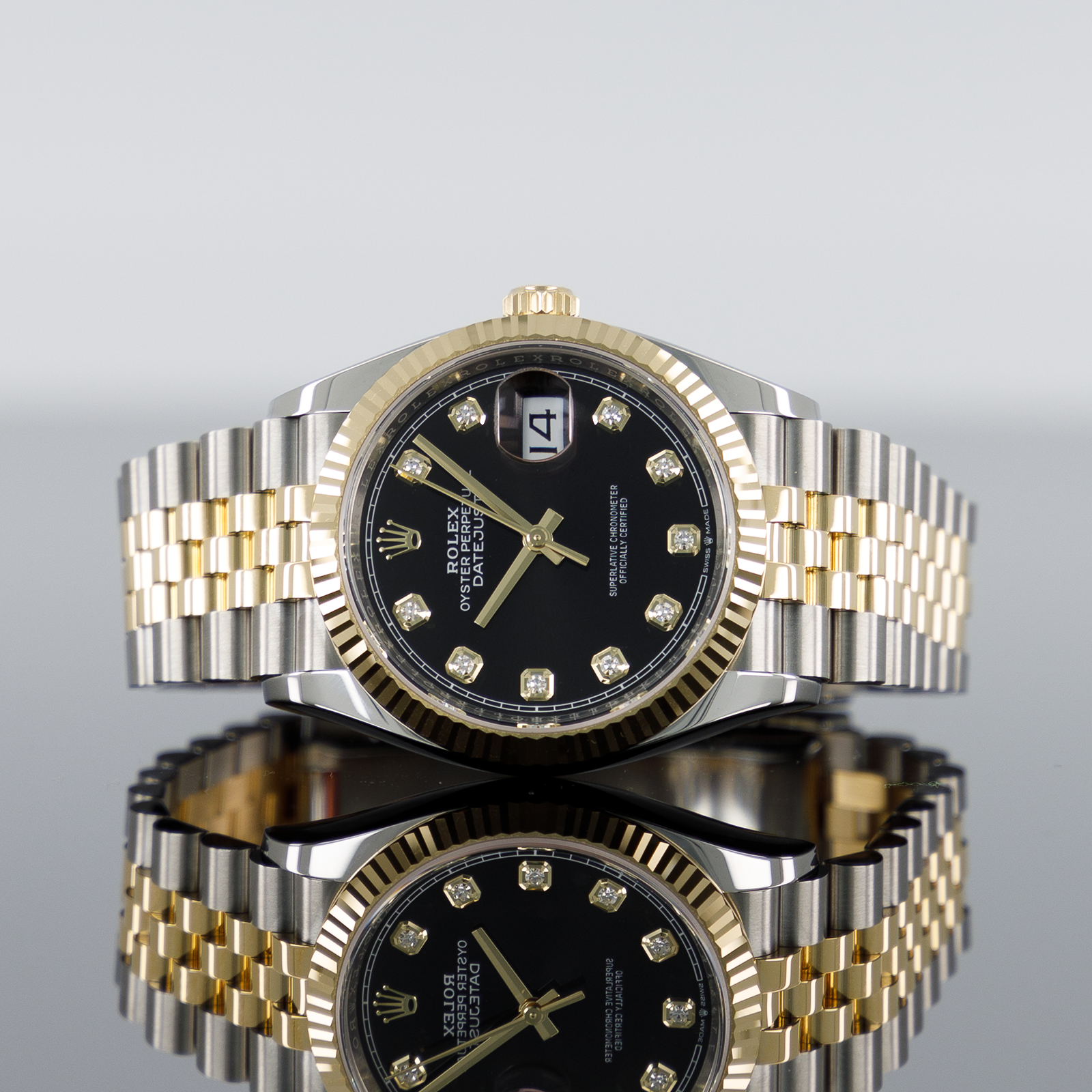 Rolex Datejust 36mm Steel and Yellow Gold Fluted Black Diamond Dial 126233