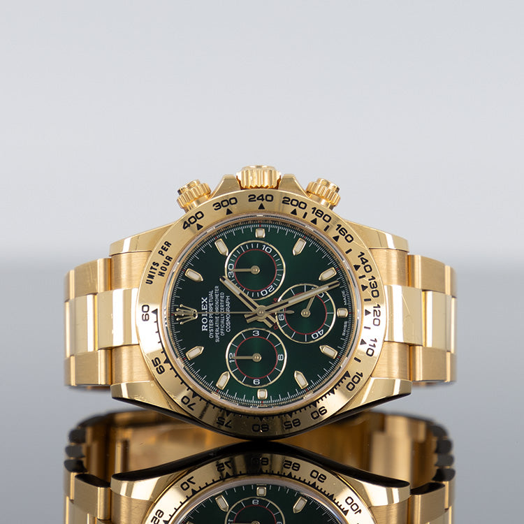 Yellow gold green dial on sale daytona