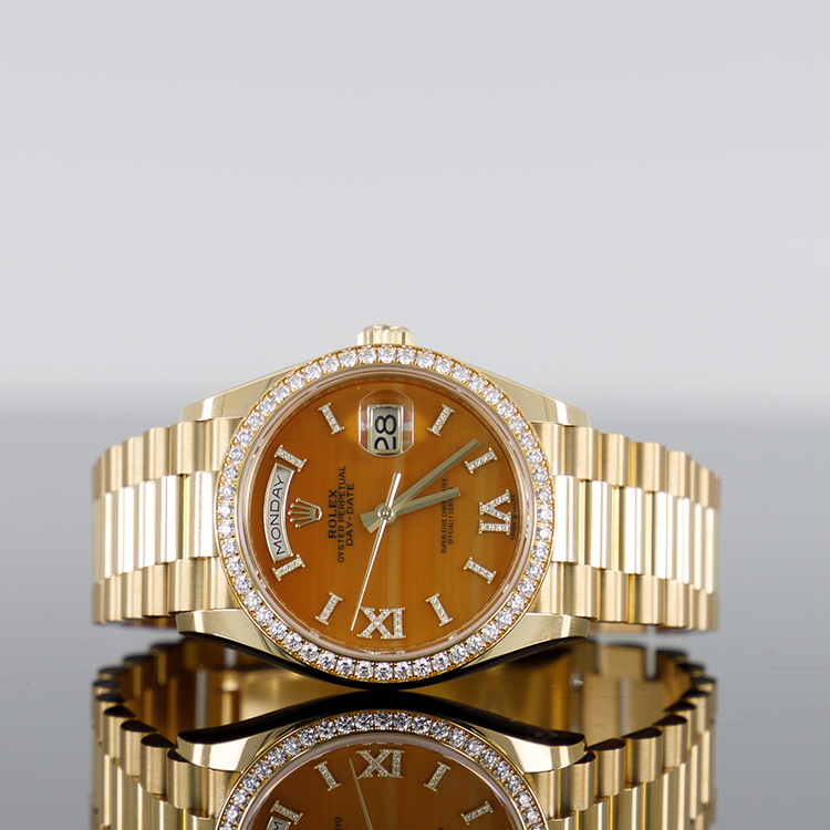 Rolex Day-Date 36mm Yellow Gold Carnelian roman dial diamond bezel 128348