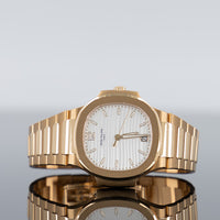 Patek Philippe 7118/1R-001 Nautilus 35.2mm Rose Gold Silvery Opaline Dial 1
