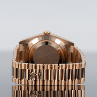 Rolex Day-Date 40mm Rose Gold Baguette Eisenkiesel Dial 228235 4