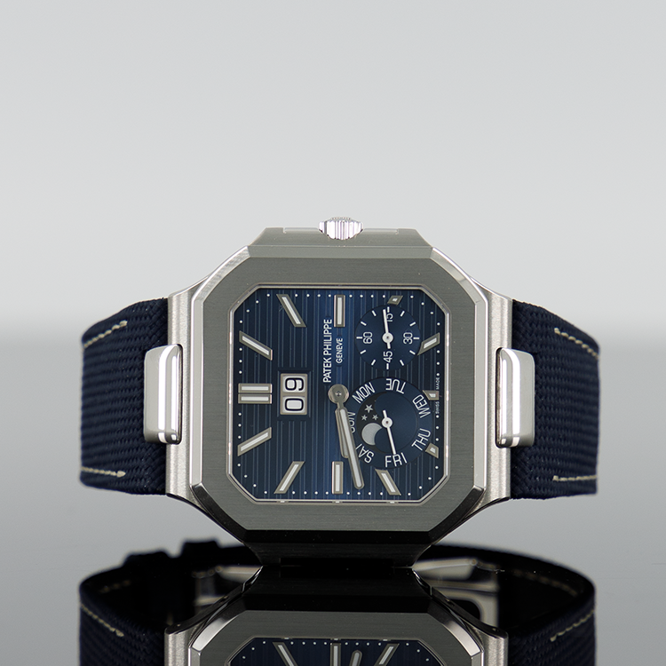 Patek Philippe 5822P-001 Cubitus 45mm Platinum Blue Sunburst Dial Navy Strap