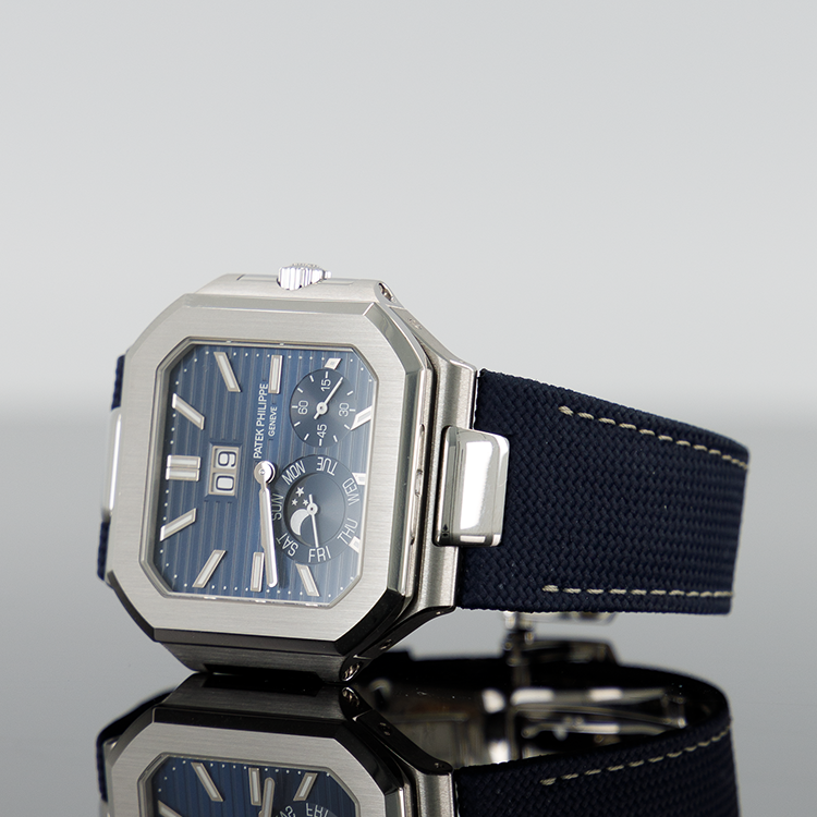 Patek Philippe 5822P-001 Cubitus 45mm Platinum Blue Sunburst Dial Navy Strap