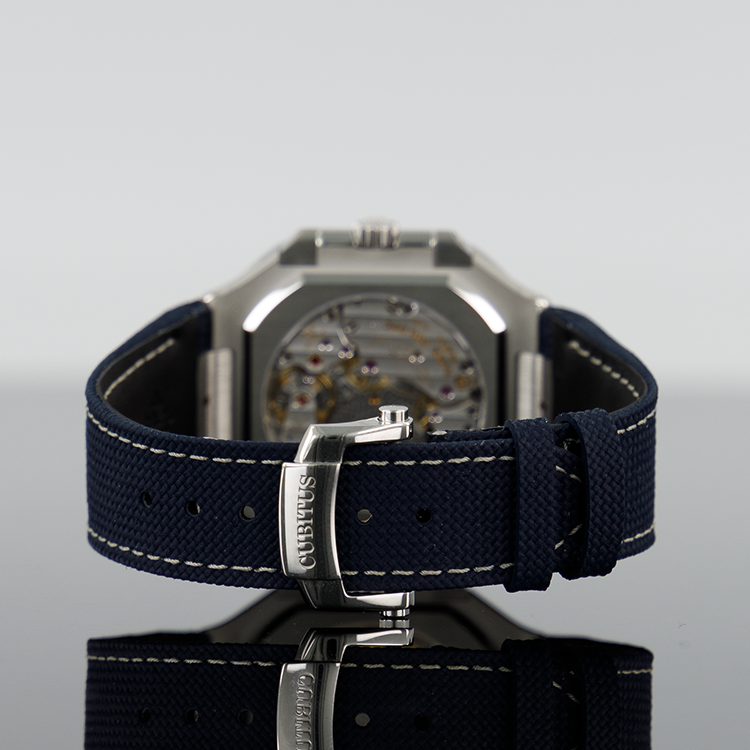 Patek Philippe 5822P-001 Cubitus 45mm Platinum Blue Sunburst Dial Navy Strap