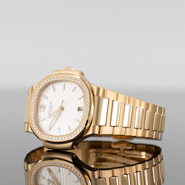 Patek Philippe 7118/1200R-001 Nautilus 35.2mm Rose Gold Diamond Bezel White Dial