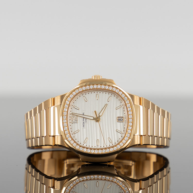 Patek Philippe 7118/1200R-001 Nautilus 35.2mm Rose Gold Diamond Bezel White Dial