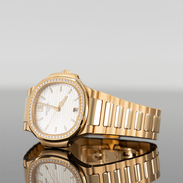 Patek Philippe 7118/1200R-001 Nautilus 35.2mm Rose Gold Diamond Bezel White Dial