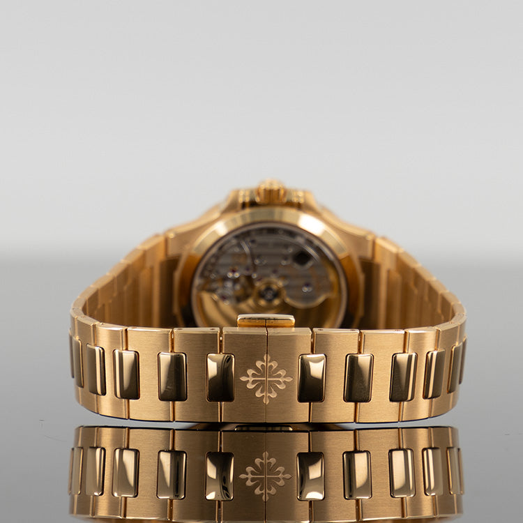 Patek Philippe 7118/1200R-001 Nautilus 35.2mm Rose Gold Diamond Bezel White Dial