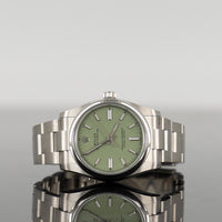 Rolex Oyster Perpetual 34mm Steel Pistachio Dial 124200 1