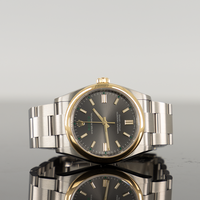 Rolex Oyster Perpetual 41mm 100 Years Grey Dial Gold Bezel 126003 1