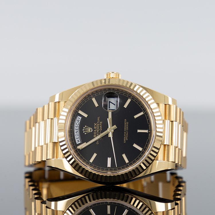 Rolex Day-Date 40mm Yellow Gold Black Index Dial 228238